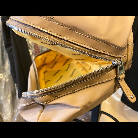 Tignanello, duo compartment, bucket style, zipper area below, a good baby bag. - Picture 9 of 14